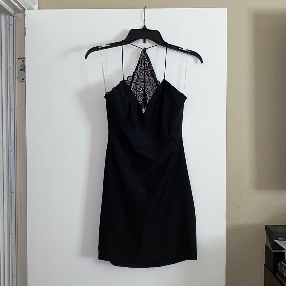Size Large. Black silk asymmetrical dress